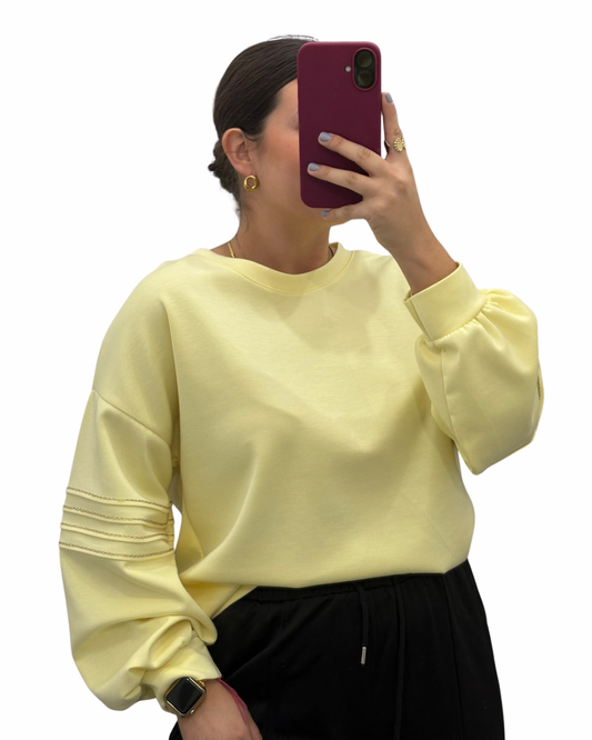 Sudadera amarillo pastel