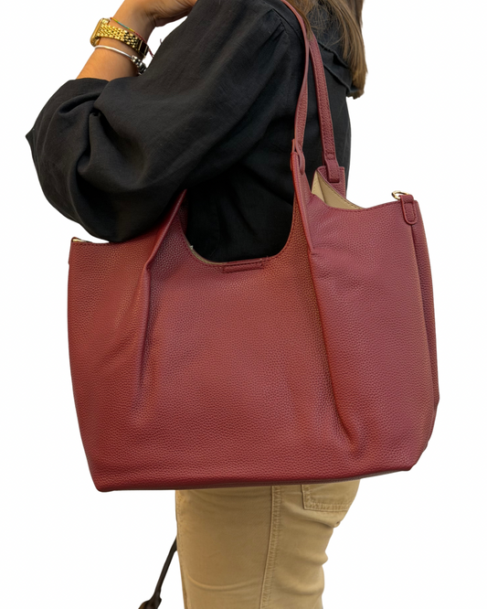 Bolso material burdeo