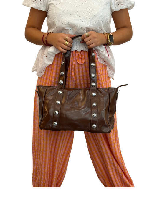 Bolso tachuela material